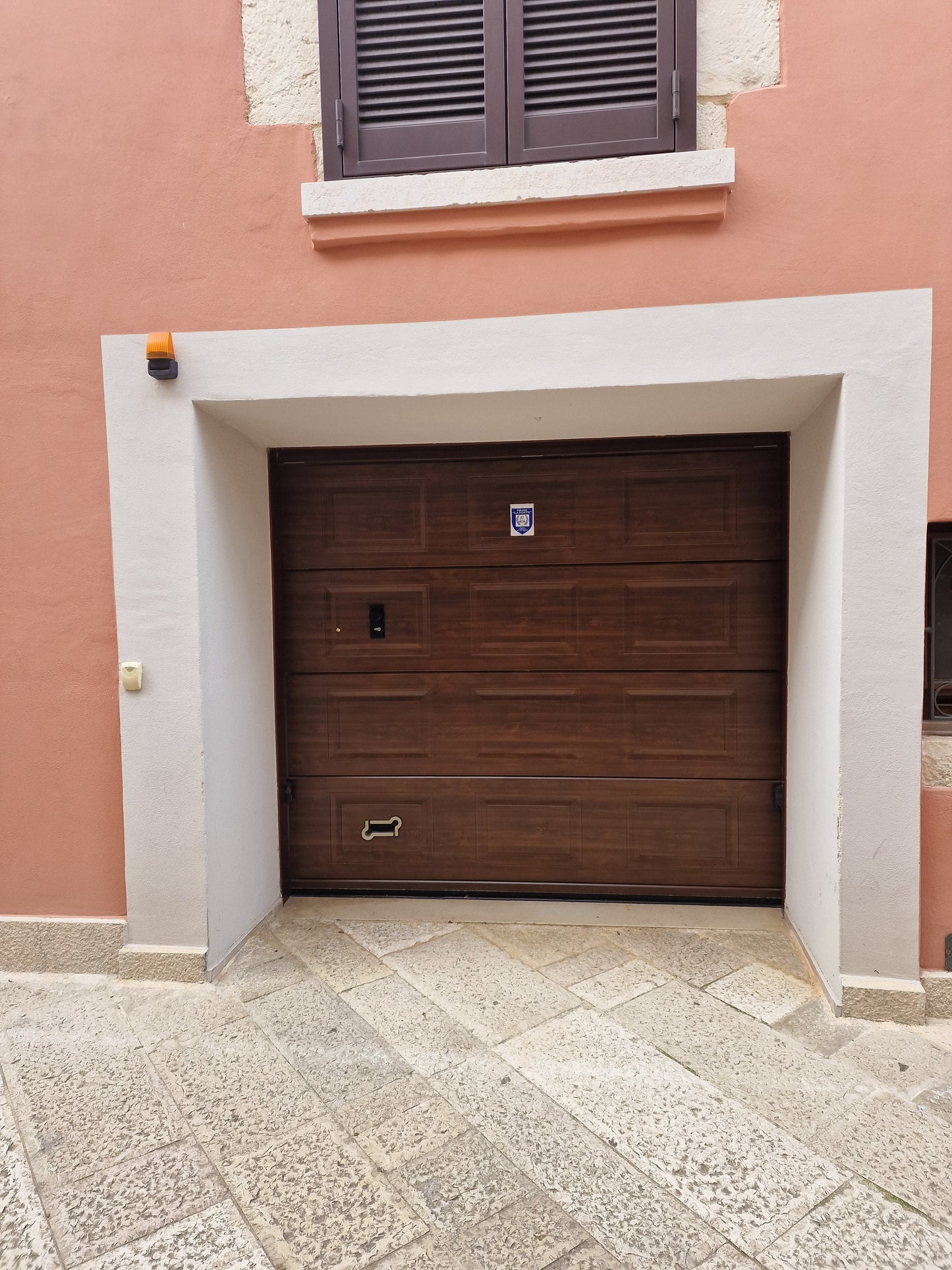 PORTONI SEZIONALI USO ABITATIVO